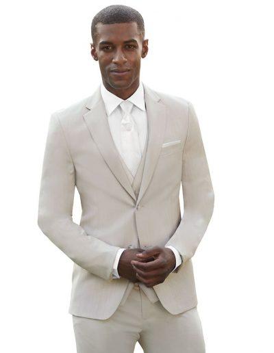 Man in a stylish cream suit available for tuxedo rental in Richardson, perfect for weddings, proms, and formal events, mens suits.