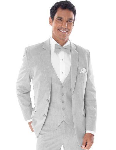 Man in light grey suit with bow tie and pocket square, Tuxedo Rental in Richardson, perfect for weddings and proms, Mens Suits