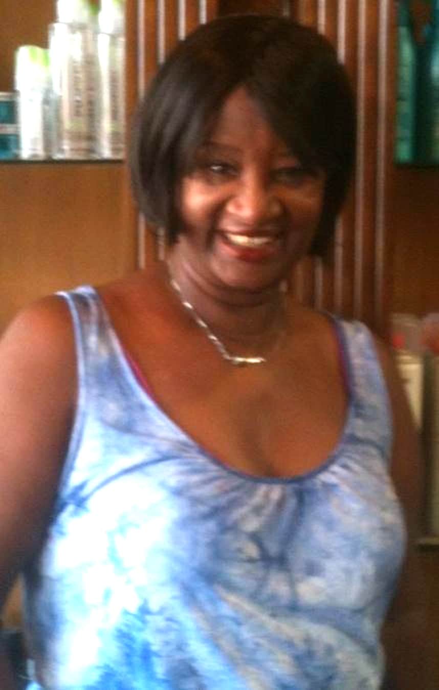 Cora Smith, hair stylist at Le's Hair Pro in Richardson, TX