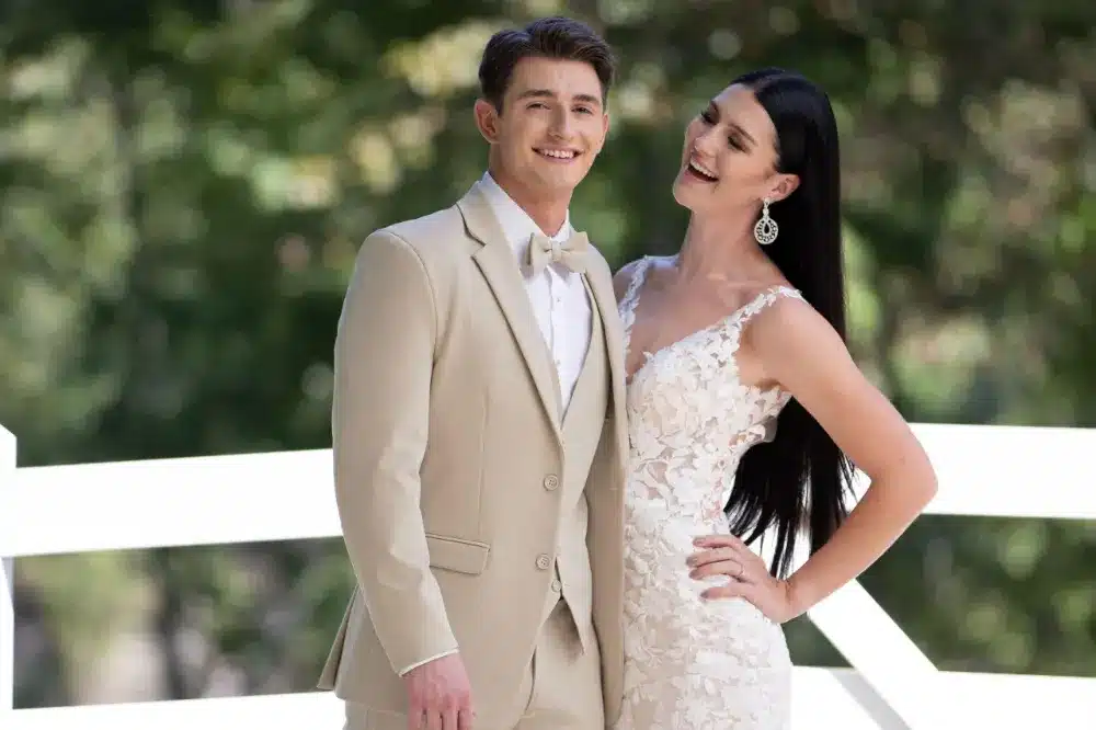 Richardson Tuxedo Rental - Elegant David Major Sand Suit for Weddings Couple in formal attire with beige suit and white lace wedding dress - Tuxedo Rental, Men's Suits, Richardson Wedding